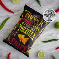 chilli-lime tortilla chips lifestyle image with the award for 2022 food producer awards silver award