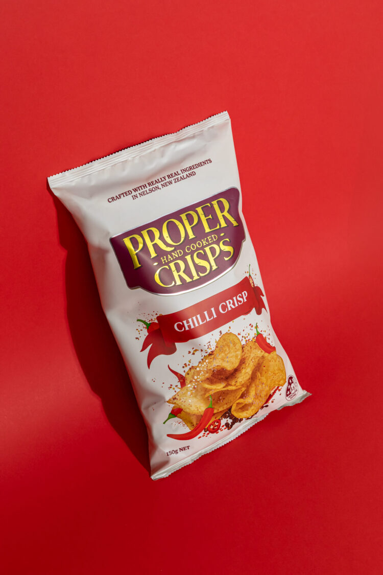 chilli crisps product image with red background