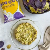 purple and gold cracked pepper and sea salt lifestyle image artichoke dip